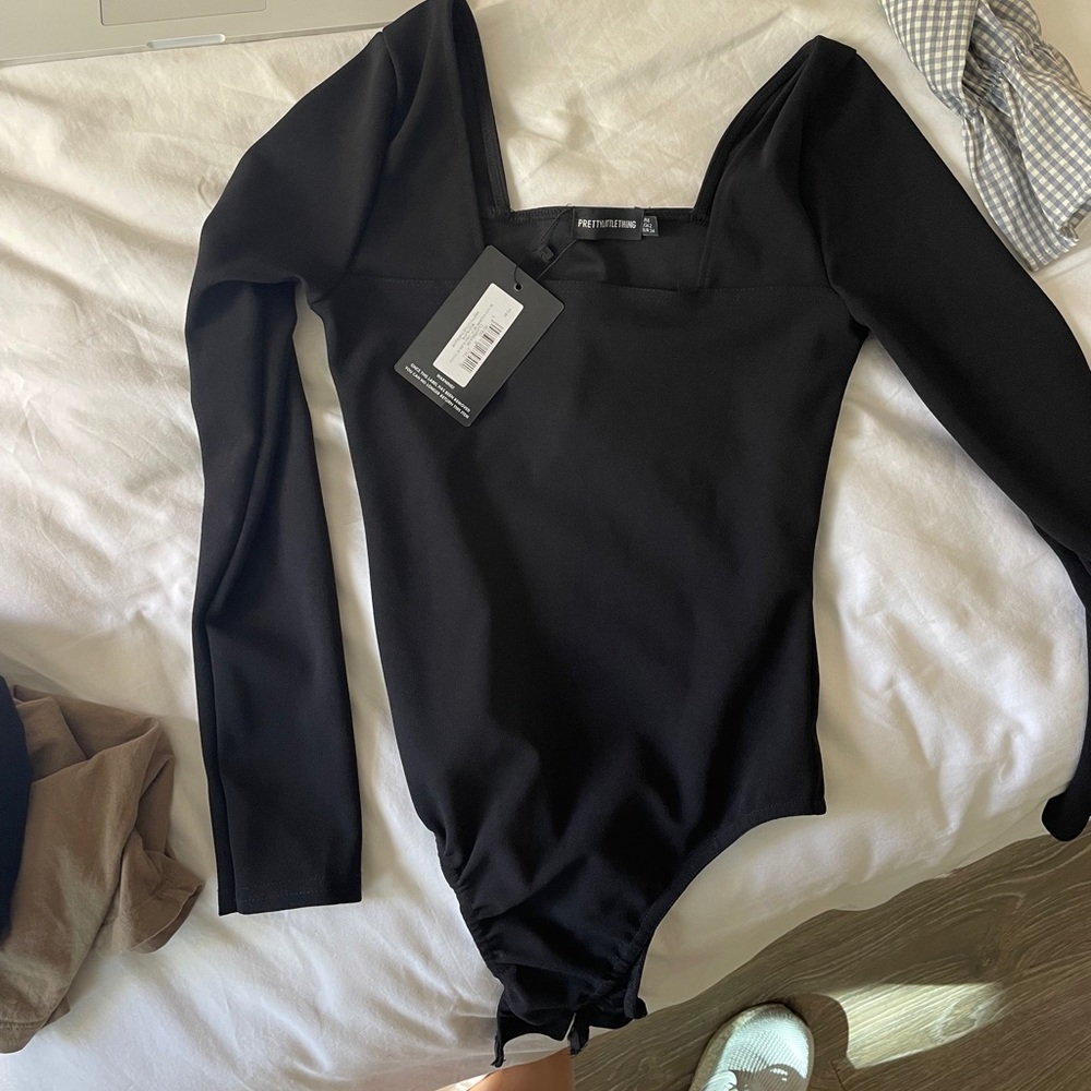 Black long sleeve body suit